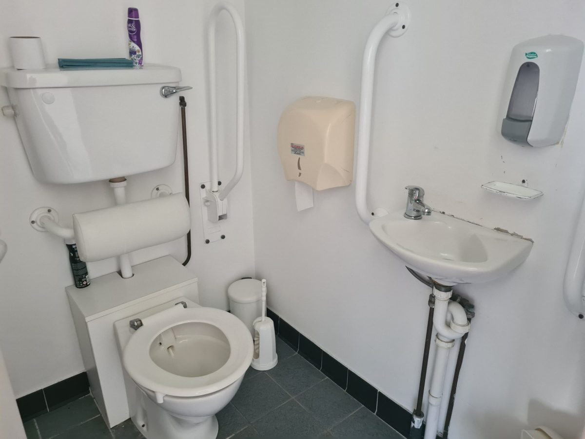Image of Wheelchair toilet facilities at Kilrush Marina Image of wheelchair accessible toilet at Kilrush Marina with sink and handrails
