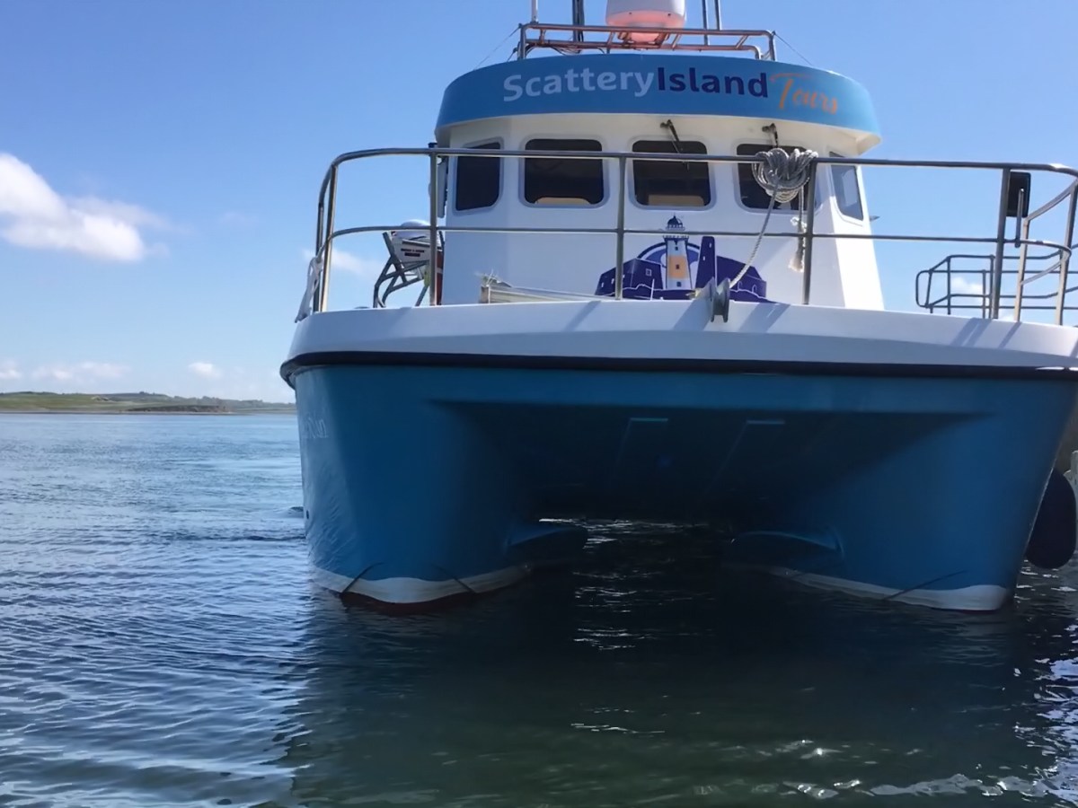 Image showing ferry at the access steps at Scattery Island Image of the ferry alongside the pier at Scattery Island showing the access steps at the pier